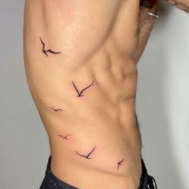 Tatuagem na costela Masculina